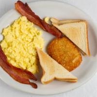 American Egg Plate · two eggs, hash brown, two strips bacon, and two toast.