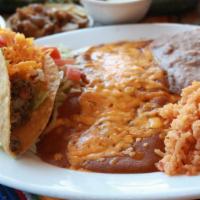 Mexican Plate · Two Enchiladas, gravy or chili, one crispy taco, rice, beans and salad.