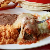 Chile Relleno Plate · one breaded-stuffed poblano pepper (cheese or beef) topped with ranchera salsa and white che...