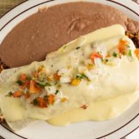 Burrito Cancun · A large burrito stuffed with grilled chicken, minced chorizo, rice and refried or black bean...