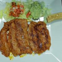 Pollo Asado · Grilled chicken breast served with lettuce, pico de gallo, guacamole, rice, refried or black...