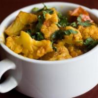 Aloo Gobi-Vegan Food · Potatoes and cauliflower cooked with cumin and spices.