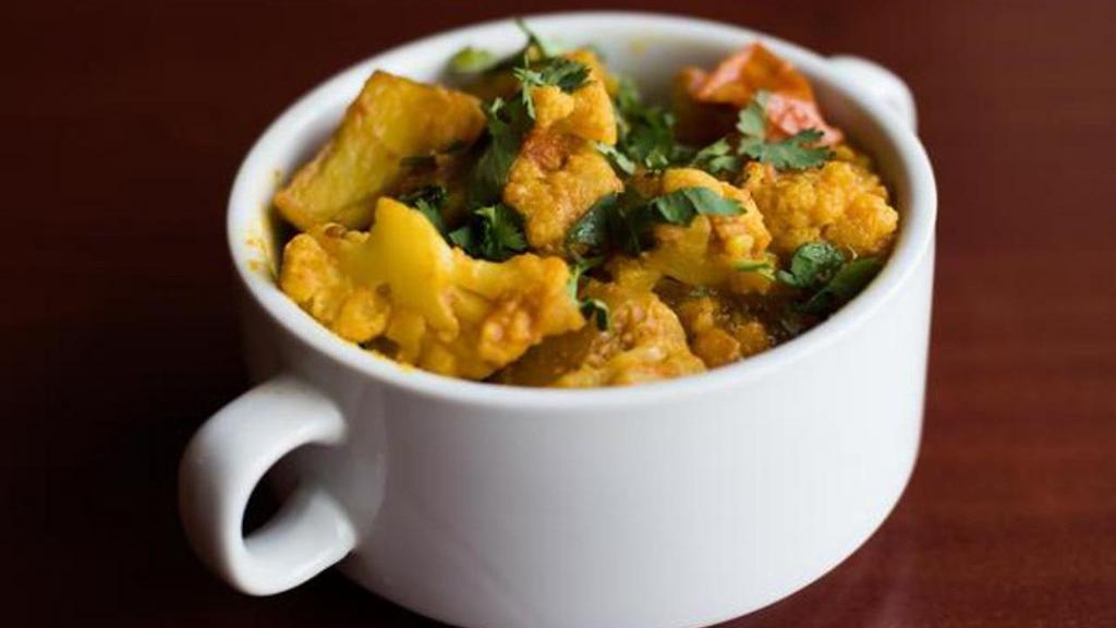 Aloo Gobi-Vegan Food · Potatoes and cauliflower cooked with cumin and spices.