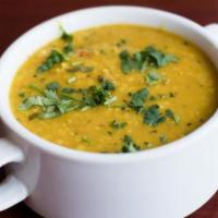 Yellow Daal Tarka-Vegan Food · Yellow lentils cooked in spices, onion and tomatoes.