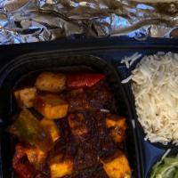Chili Paneer · Chunks of cheese stir-fry in hot sauce, onion and green peppers.