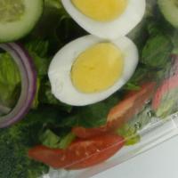 Green Salad · Lettuce, tomatoes, cucumbers, green peppers, onions and boiled eggs.