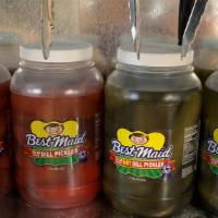 Dill Pickle · Red and purple kool aid flavored pickles.