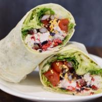 Chicken Taco Wrap · Romaine and iceberg mix, red onion, roasted chicken, cheddar, black beans, grape tomatoes, c...