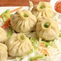 Chicken Momo’S  · Dumplings filled with minced chicken and steamed