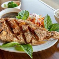 Crispy Whole Red Snapper · Deep fried whole Red Snapper (1.5lb) served with a choice of sauce on the side.