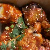 Korean Fried Chicken Wings · With caramelized kimchi and all of those Asian spices. These guys will keep you coming for m...