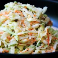Jammin' Coleslaw · Made with fresh Cabbage and Carrots this creamy side makes for great company with your prote...