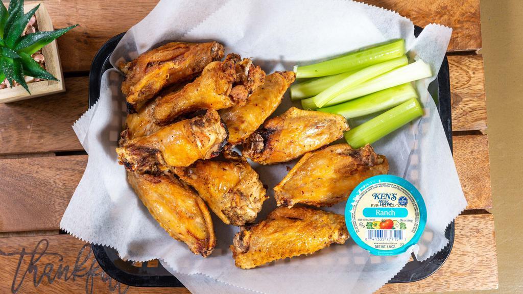 10 Wings · Marinated and deep fried. served with celery and choice of dressing.