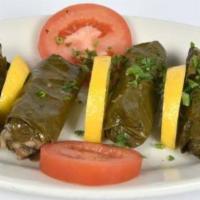 Grape Leaves Dolma · Grape leaves stuffed with rice, mixed with pine nuts, onion and spice.