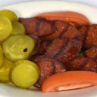 Sucuk Kizartmasi · Gluten free. Grilled Turkish sosic served with pickles.