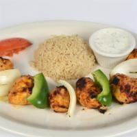 Chicken Shish · Gluten free. Charcoal grilled tender chunks of marinated chicked breast skewered. Served wit...