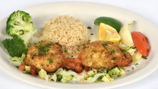 Jumbo Crab Cake · Lump crab cake served with rice pilaf and vegetables. Served with home made bread.
