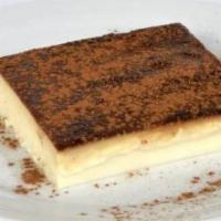 Kazandibi · A thick, milky pudding served with golden-brown coating of caramelized sugar on the outside.