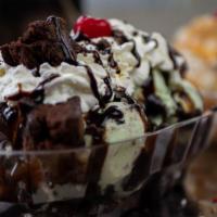 Brownie Delight Sundae · Brownie foundation, mint oreo or brownie chip ice cream, oreo cookie crumbles with chocolate...