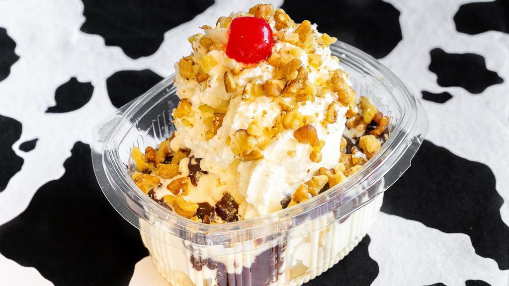 Hot Fudge Sundae · Your choice of our super premium ice cream with hot fudge, nuts and topped with whipped cream and a cherry. *** our products may contain nuts ***