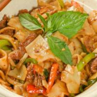 Drunken Noodle · Spicy.  Big flat rice noodles stir-fried with spicy chili,  garlic sauce,  onions, bell pepp...
