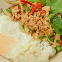 Spicy Basil Chicken With Fried Eggs · Spicy. Ground chicken stir-fried with green beans, bell pepper, onion, spicy garlic sauce an...