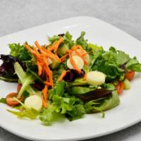 The Palm Mixed Green Salad · Romaine, iceberg, baby greens, radish, scallions, cherry tomatoes, carrots, tossed in garlic...