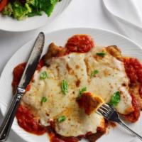 Chicken Parmigiana · Classic Chicken Parmesan topped with marinara sauce, Parmesan and Muenster cheese and finish...