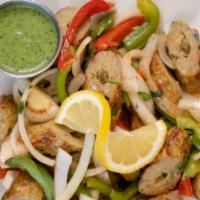 Chicken Seekh Kabab · Minced chicken, onion, ginger, green pepper