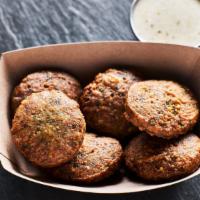 Falafel​ ​Bites (3 Pieces ) · A Staple Middle Eastern dish. Consist of fried patties of ground chickpeas and fava beans.  ...