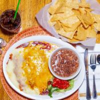 Enchiladas · Choice of two cheese and onion enchiladas, two ground beef or chicken.