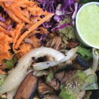 Mushroom Fajita Salad · What's a salad! Layers of bean salad, quinoa, avocado slices, portabella fajitas, cabbage, a...