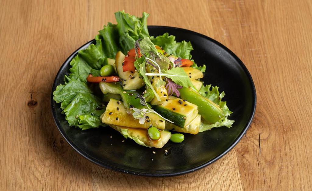 Cucumber Salad · Salad | Cucumber sticks with edamame and bell peppers, tossed in our sesame soy glaze. (Gluten-free, vegan & vegetarian)