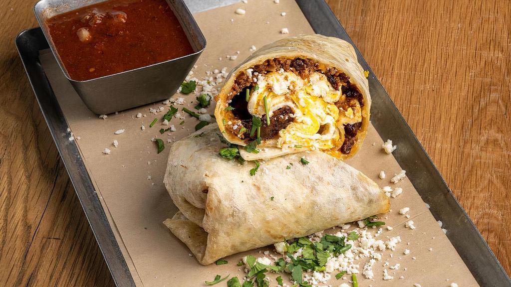 Chorizo Breakfast Burrito · Brunch | Served with eggs, salsa and cheese