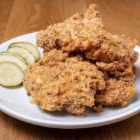 Chicken Strips ⭐ · Shares & Sides | Hand breaded chicken strips served with ranch and house pickles, choice of ...