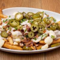 Farmer Nachos · Shares & Sides | fries, bacon, country gravy, cheese curds, green onion
