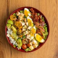 Classic Cobb Salad · Salad | Romaine, grilled chicken, tomato, avocado, egg, bacon, maytag blue, chives, french v...