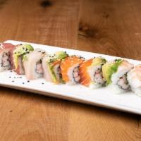 Rainbow Roll · Sushi Roll | California roll topped with tuna, salmon, yellow tail, avocado & shrimp (8 piec...