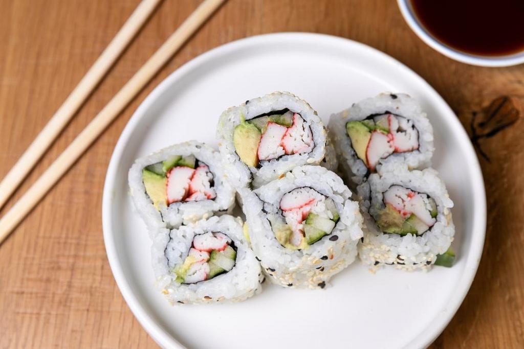California Roll · Sushi Roll | Kani kama crab, cucumber, avocado rolled in seaweed.. (eight pieces) (Gluten-free)