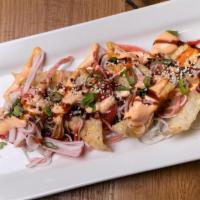 Spicy Crab Salad · Starter | shredded crab, cucumber, seaweed in spicy sauce with tempura crunchies