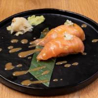 Miso Salmon · Sushi | fresh salmon, su miso sauce, crispy peppered rice, marinated cucumber  (Gluten-free)