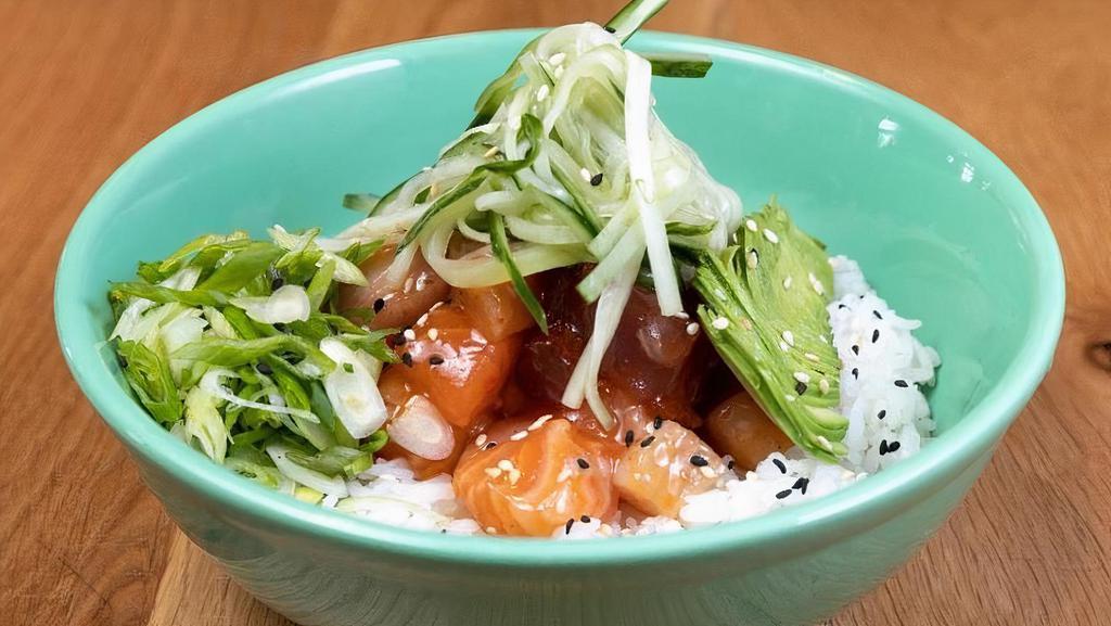 Poke Bowl Trio · Entree | Sashimi grade tuna, salmon & yellowtail, poke sauce, marinated cucumbers, avocado, scallions, toasted sesame. (Gluten-free)