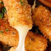Mozzarella Sticks · Our Deep fries Golden cheese sticks cooked to your perfection, served with our homemade Mari...