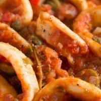 Portuguese-Style Calamari · Tender squid rings. prepared in a saffron sauce made with chorizo, hot peppers, roasted red ...
