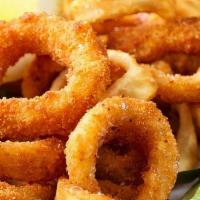 Calamari Fritto · Tender squid rings, lightly floured & pan-fried, tossed in hot peppers & lemon juice.. Spicy