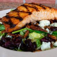 Salmon Salad · Mixed field greens with crumbled gorgonzola,pecans and dried cramberries. Topped with Pacifi...