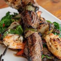Mediterranean Kebobs* · Two skewers with onion slices and bell peppers seasoned & grilled to perfection.. Beef / Chi...