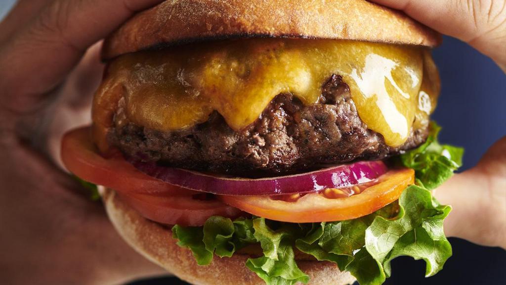 Classic Cheese Burger* · Topped with cheddar cheese, fresh lettuce, tomato, onion & mayo.. *Consuming raw or undercooked meats, poultry, seafood, or eggs may increase risk of foodborne illness