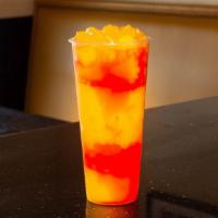 Malibu Sun · Mango, peach, pineapple, honey syrup, + mango jelly and passion fruit pop boba.