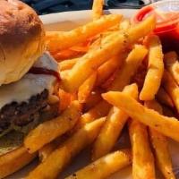 Messy Burger · Cheddar, bacon, chipotle mayo, lettuce, tomato on a  brioche bun. Served with french fries.